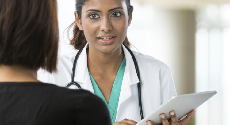 Doctor educating patient