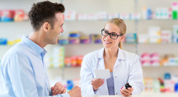 Pharmacist talking to patient about their prescription medication