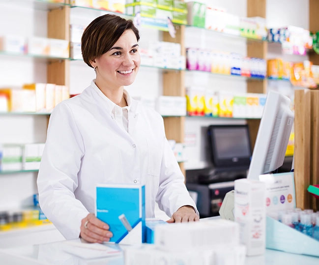 pharmacist checking inventory on tablet