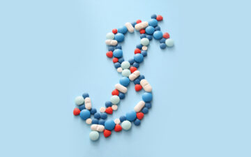 Dollar sign made of red, white and blue pills