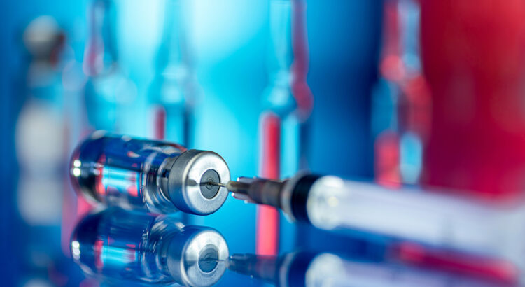 Close up shot of vaccines in a laboratory - Illustration for flu shot and Covid-19 vaccines