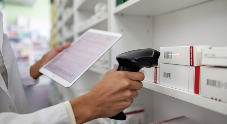 Pharmacist taking inventory