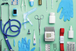 Flat lay composition with medical objects on color background