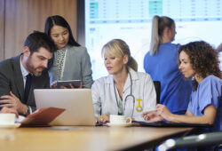 medical professionals meeting with some business associates