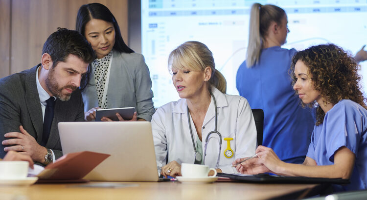 medical professionals meeting with some business associates